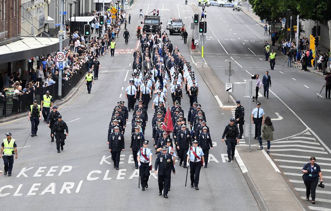 The majority of Queensland police officers say they are bogged down in red tape and a quarter don’t have the tools to do their job effectively. Photo: AAP/Dan Peled