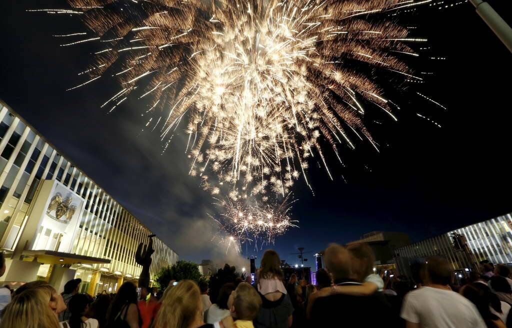 Crowds watch the 9pm Fireworks show in Civic Square as part of Canberra's New Years Eve Celebrations in December 2012. Photo: Jeffrey Chan