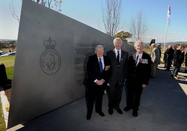 The son of Admiral Sir John Crace,  Christopher Crace, centre, with  Battle of the Coral Sea veterans,  Gordon Johnson, of Weetangera, left, and Derek Holyoake, right, of Queanbeyan, at the ceremony in Crace to dedicate the Coral Sea-Crace memorial  to the  Coral Sea battle by the Royal Australian Navy. Photo: Richard Briggs