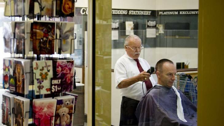 Barber Phillip Aricidiacono is retiring at 75 after a lifetime of cutting hair. Photo: Jay Cronan