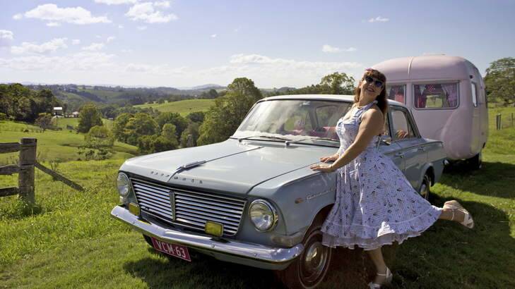LADIES OF THE ROAD: Lisa Mora, her (then blue) Vauxhall Cresta and her vintage caravan ''Betty Page-Turner''.