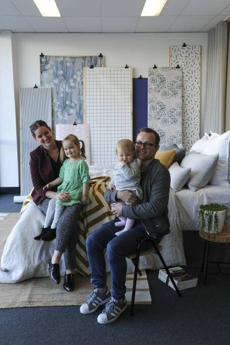 Belle and Tim Chadwick with their children Billie (1) and Kit (4) at Cloth and Paper Studio in Fyshwick.  Photo: Graham Tidy