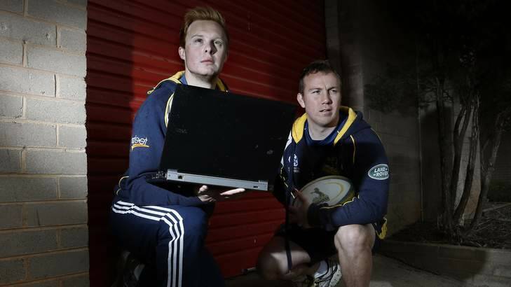 University of Canberra sport studies honours students Ryan Tredinnick, left, and Trent Hopkinson are working with the Brumbies as part of their studies. Photo: Jeffrey Chan
