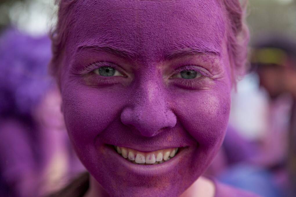 Jess McManus at the Purple station for the Colour Run in Canberra. Photo: Jay Cronan