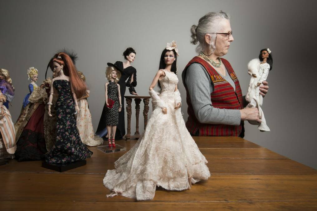 Julie Manley with some of her dolls on display at CMAG. Photo: Rohan Thomson
