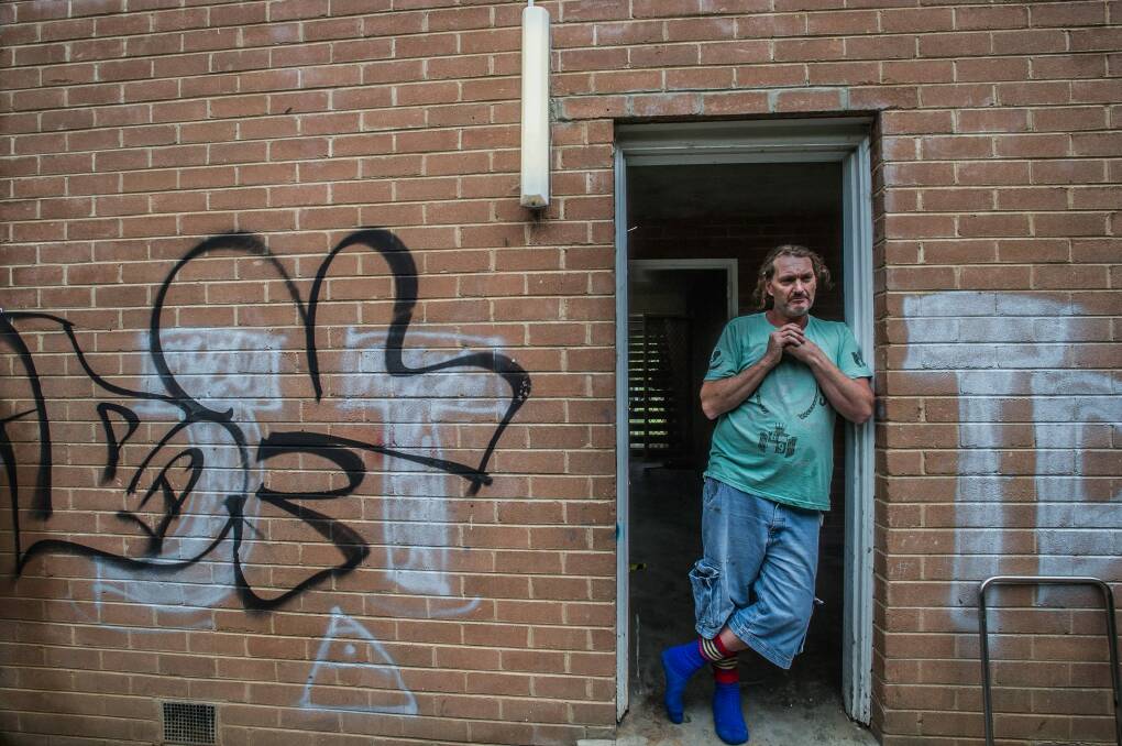 Red Hill flats resident Troy Osborn: Can't wait to move from a place he says scares his son. Photo: Karleen Minney