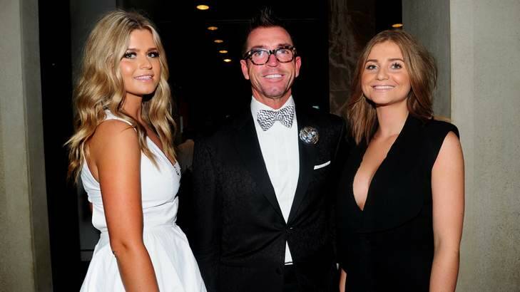 Richard Luton with daughters Madison, left, and Sophie, at the awards ceremony at Parliament House. Photo: Melissa Adams