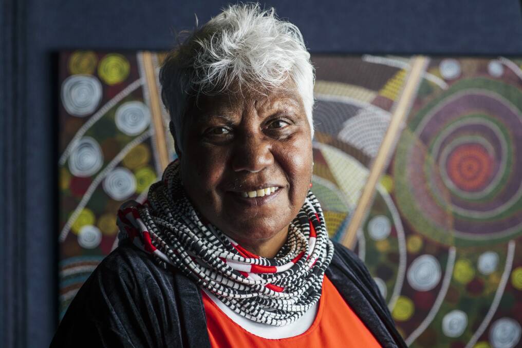 Artist Marion Dingo with her work 'Between the Lines'.  Photo: Rohan Thomson