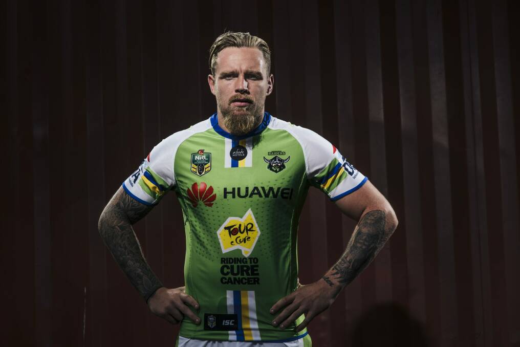 Canberra Raiders five-eighth Blake Austin, wearing the Tour de Cure jersey the team will wear in their game against the Bulldogs on Sunday. Photo: Rohan Thomson