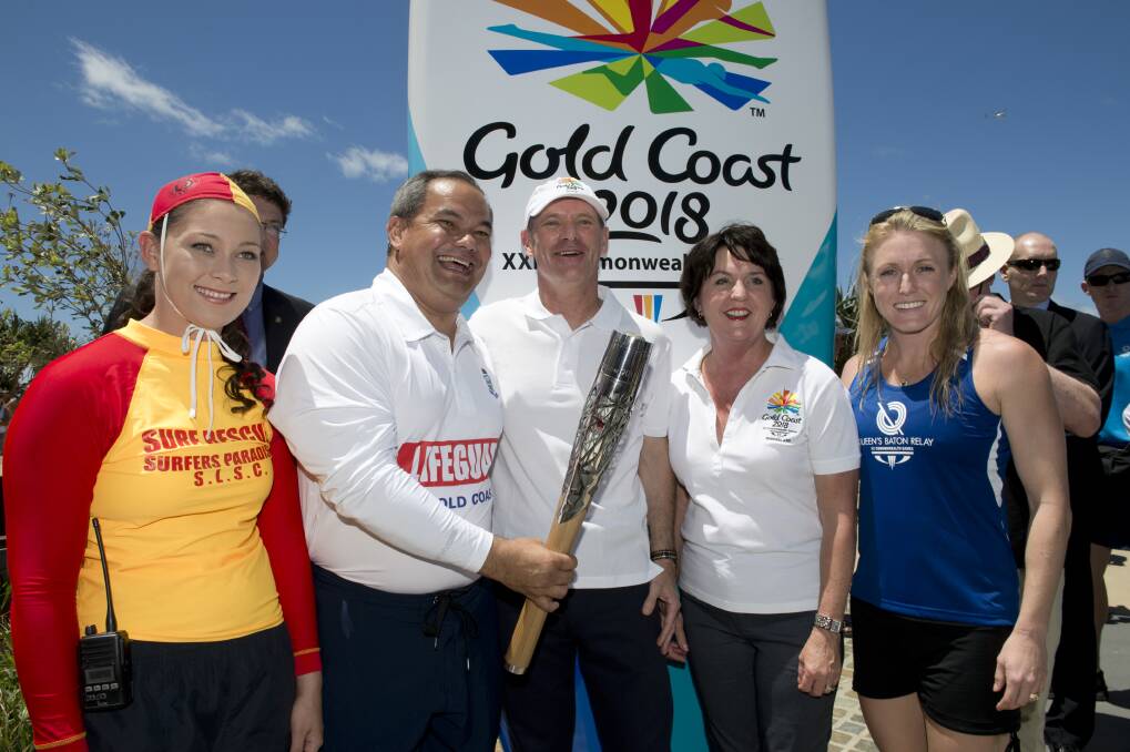 Then-premier Campbell Newman with Gold Coast mayor Tom Tate and then-Games Minister Jann Stuckey during the 2013 Queen's Baton relay. Photo: Dave Hunt/AAP