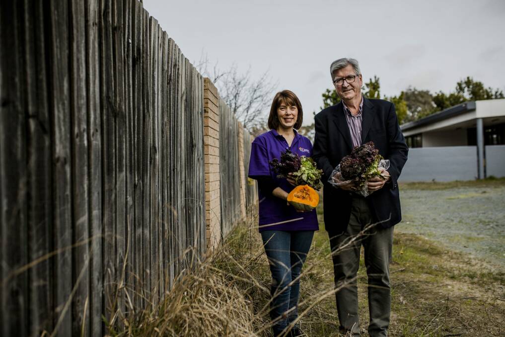 Canberra City Care operations manager Danielle Bate, and Hands Across Canberra CEO Peter Gordon. Photo: Jamila Toderas