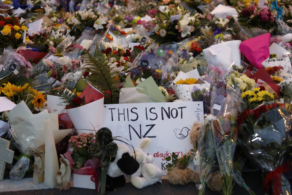 Flowers lay at a memorial near the Masjid Al Noor mosque in Christchurch.  Photo: AP