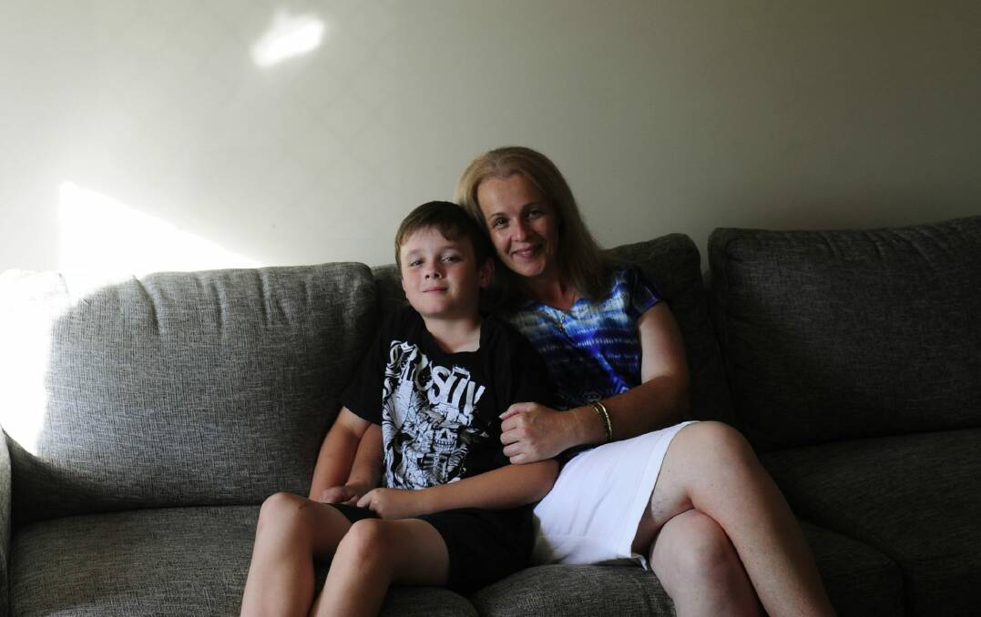 Brodie Collins and his mum, Tracey, at their family home in Harrison. Photo: Melissa Adams