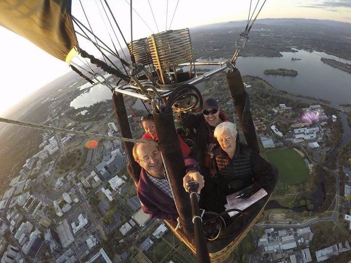 Pilot Steve Griffin (front left), owner Kay Turnbull (front right), Katrina Turnbull (back left) and John Turnbull (back right) fly Golly the hot air balloon. Photo: Steve Griffin