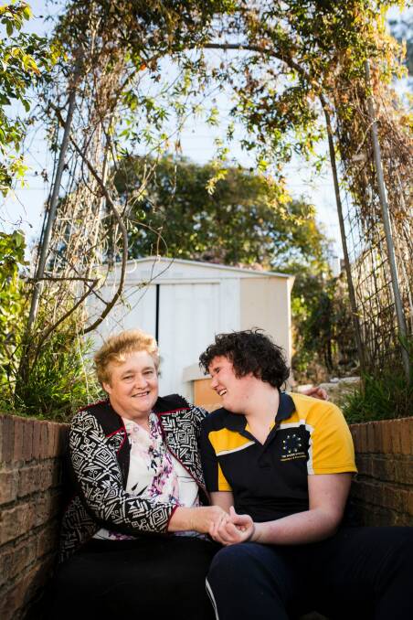 Karna O'Dea at home with her son Malcolm, who has complex needs and uses Marymead's respite service every second weekend. Photo: Jamila Toderas
