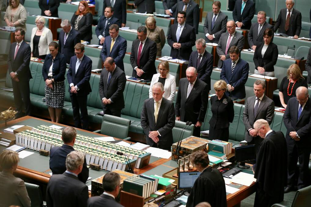 The House of Representatives observe a moment of silence as a mark of respect for victims of the terrorist attacks in Paris,  at the start of question time on Monday. Photo: Alex Ellinghausen