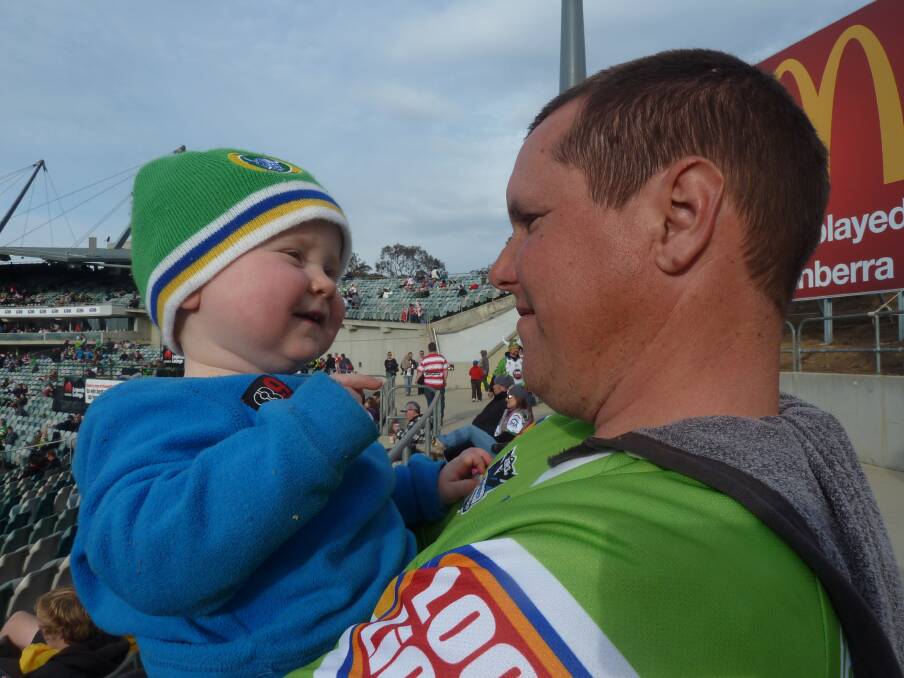 Toby Jamieson with son William at a Raiders game in 2013. Photo: Jamieson family