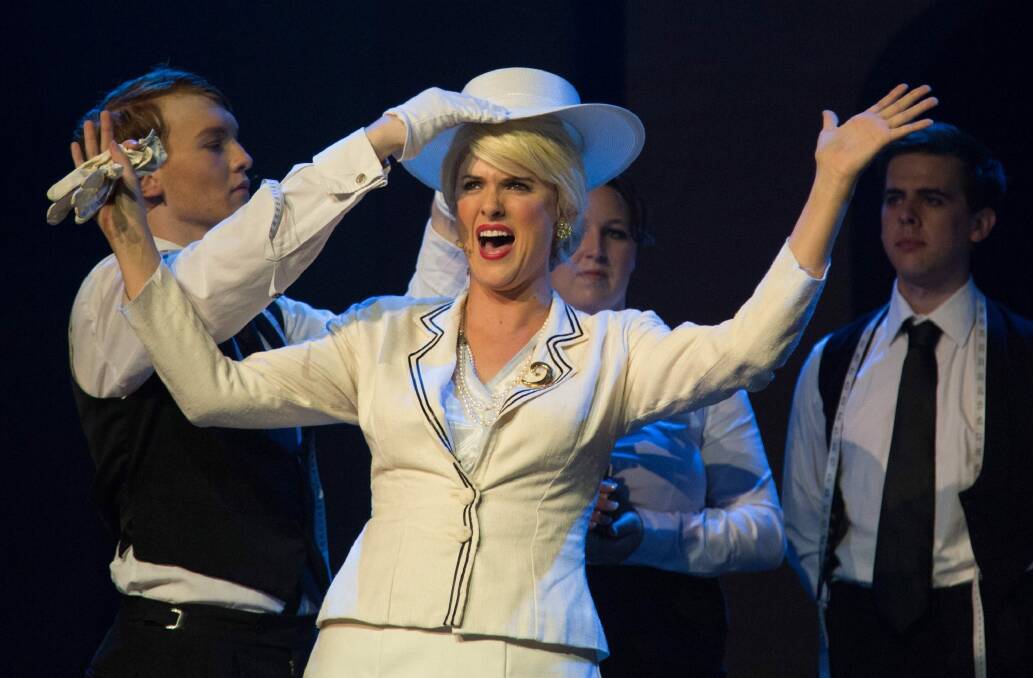 Jake Willis, Esther Ramsay, James Tighe and Kelly Roberts as Eva Peron in Canberra Philharmonic's production of Evita.  Photo: Donna Larkin