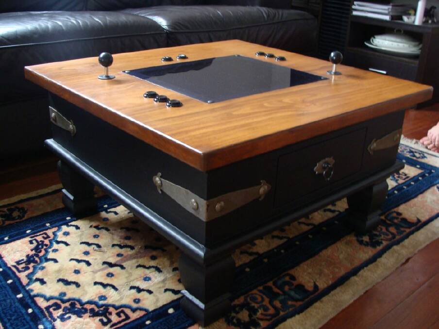 An arcade coffee table created by Gold Coast hobbyist Shane Pont who started his own small business Arcade Furniture. Photo: supplied pic