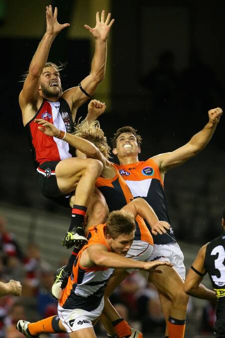 Josh Bruce takes a mark of the year contender against the GWS Giants Photo: Getty Images