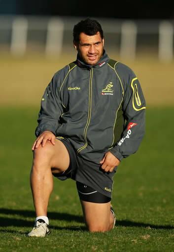George Smith stretches during an Australian Wallabies training session on July 2 in Sydney. Photo: Getty Images