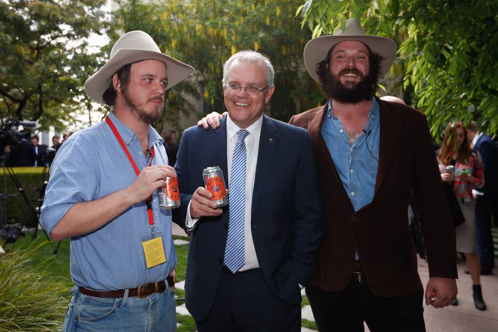Then treasurer Scott Morrison with Errol and Clancy at the launch of ‘Betoota’s Australia' last October. Photo: Alex Ellinghausen