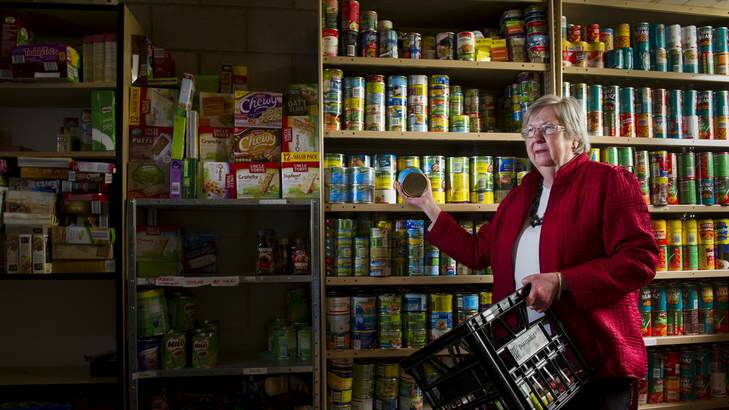 Sue Jordan of St John's Care in one of their grocery storage rooms. Photo: Rohan Thomson