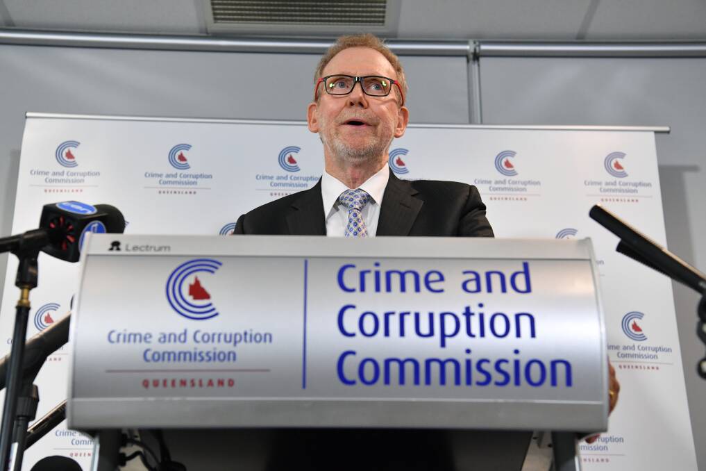 Crime and Corruption Commission chairman Alan MacSporran presented the report to Speaker Curtis Pitt. Photo: Darren England - AAP