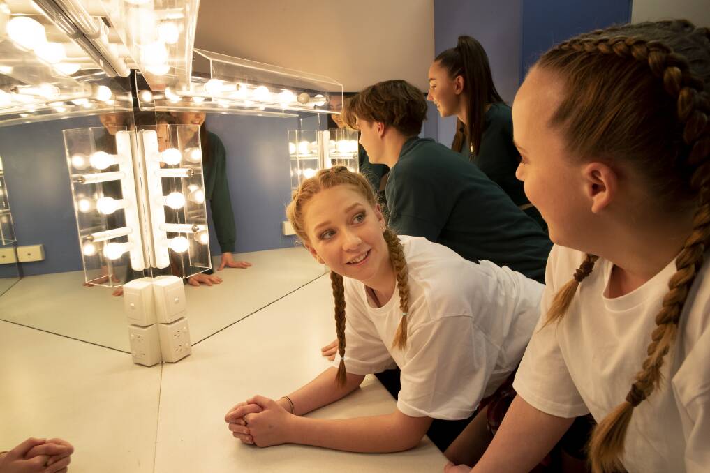 Caroline Chisholm High School dancers Kailey Jitts and Mikayla Leishman backstage at Canberra Theatre, with Canberra College dancers Thomas Adams-Walker and Lizzie Rice. Photo: Sitthixay Ditthavong