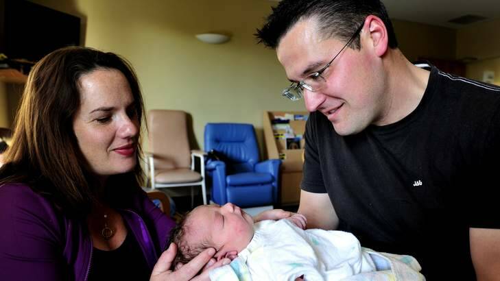 Zed Seselja and wife Ros welcome the latest addition to their family, baby Grace Seselja. Photo: Melissa Adams