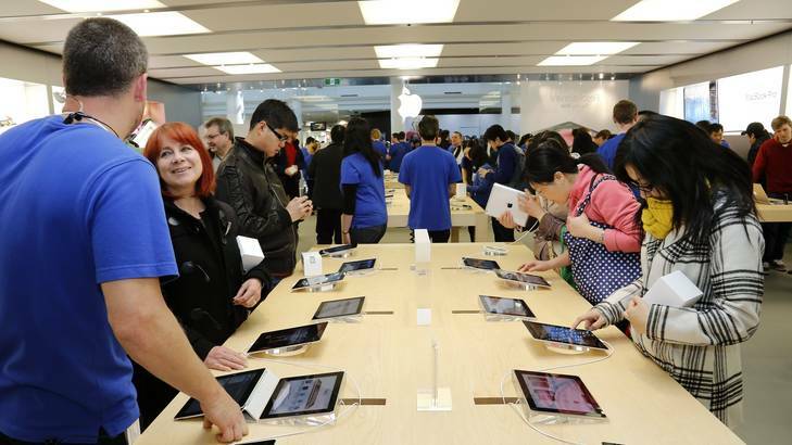 People inside the Apple Store at the Canberra Centre during the Grand Opening. Photo: Jeffrey Chan