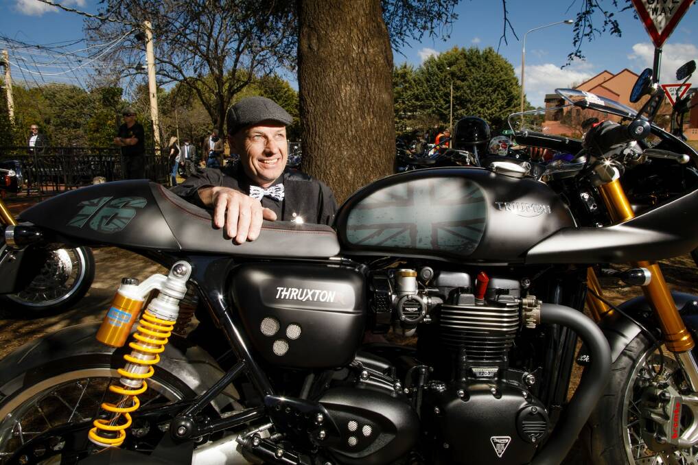 The organised of the Distinguished Gentleman's Ride in Canberra, Simon Whittaker, poses with his Triumph motorbike.  Photo: Sitthixay Ditthavong