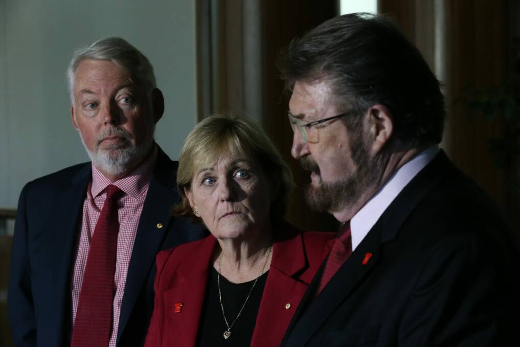 Senator Derryn Hinch with Bruce and Denise Morcombe at Parliament House. Photo: Andrew Meares