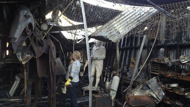 Braidwood artist Suzie Bleac in the burnt-out study used by her and her partner Andy Townsend. Photo: Nick Stranks