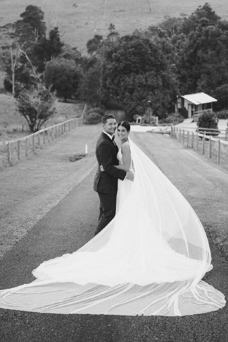 The bride's veil was a metre longer than her gown. Photo: Bushturkey Studio