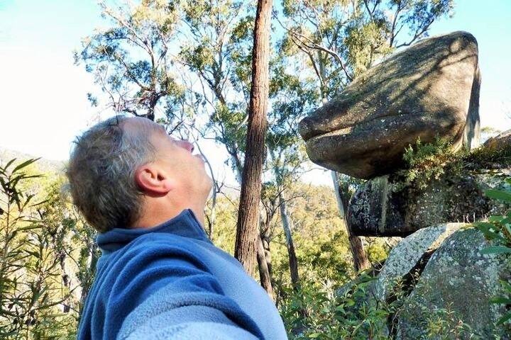 Thomas Schulze puckers up to the "kissing rock" in Namadgi National Park.  Photo: Thomas Schulze