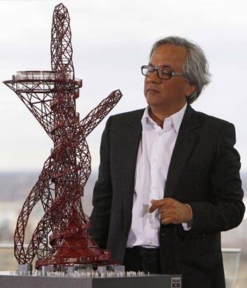 British artist Anish Kapoor with a scale model of the Orbit. Photo: Reuters