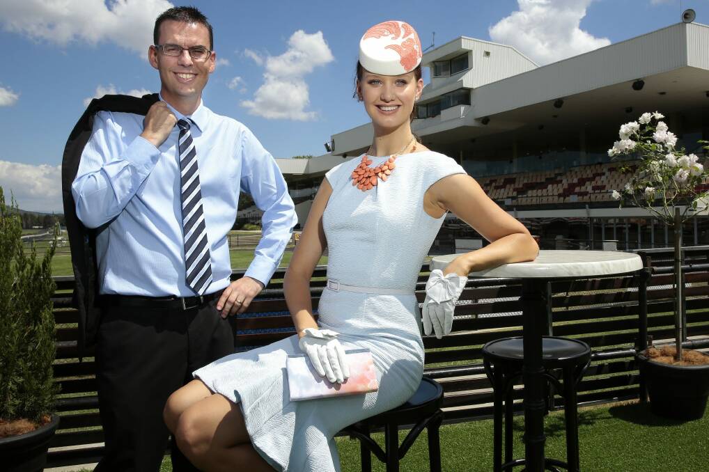 Face of Canberra Racing Emily Dibden with Canberra Racing Club chief financial officer Andrew Clark in the Seppelt marquee at Thoroughbred Park ahead of the 2015 Black Opal Stakes Day.  Photo: Jeffrey Chan