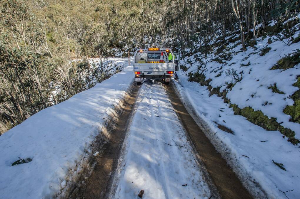 Transport Canberra and City Services? Project Officer Adam Melville looks after icy or snow affected roads in the Namadgi National Park area (near the Mount Franklin chalet site) Photo by Karleen Minney. Photo: karleen minney