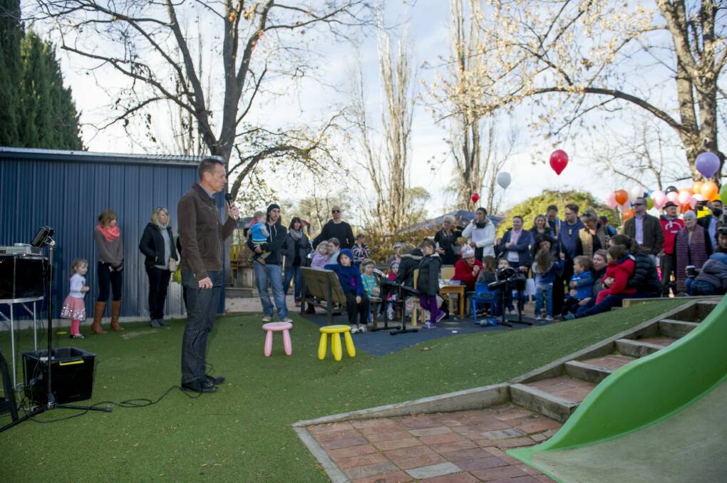 ACT Greens minister Shane Rattenbury speaks to the crowd at the Manuka Occasional Childcare Centre on Sunday.  Photo: Jay Cronan
