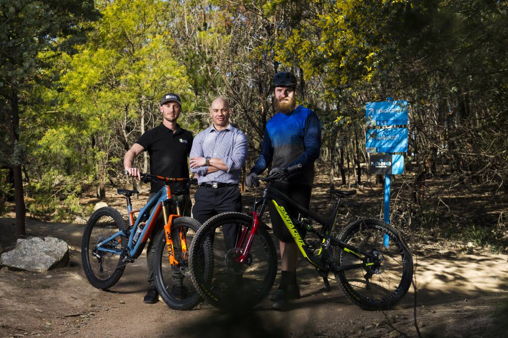 Mountain bikers Ryan Walsch, Michael Clark and Josh Kentwell. who say there is a need for more challenging trails in Stromlo Forest Park. Photo: Dion Georgopoulos