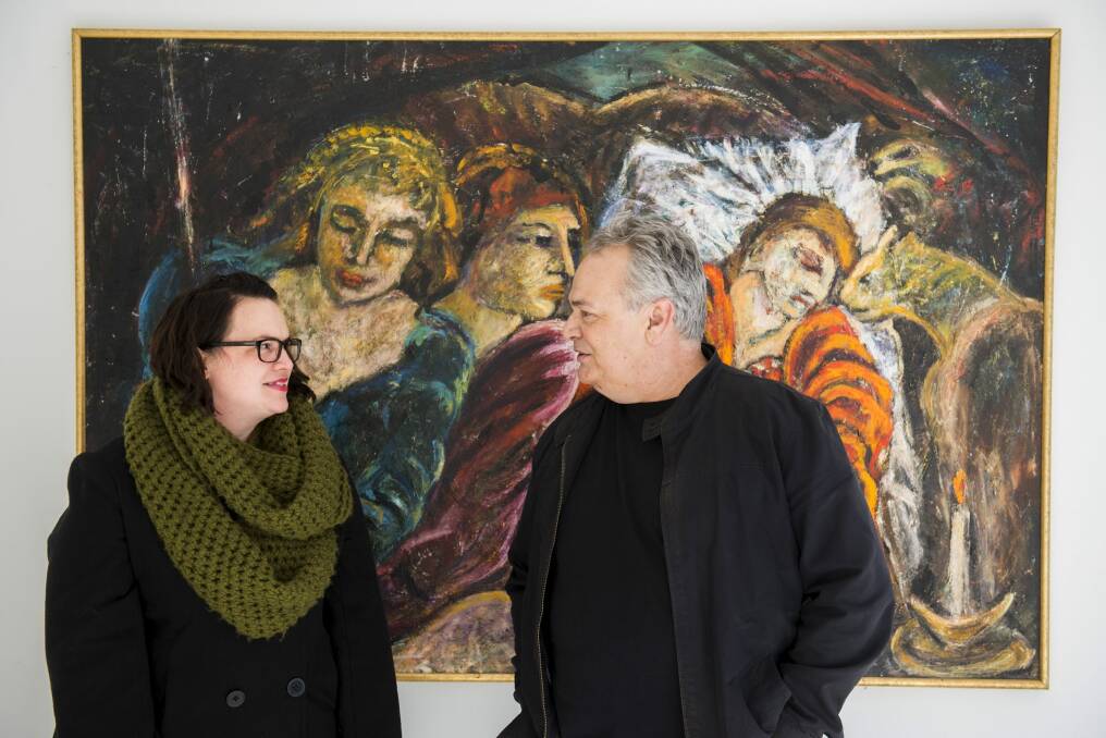 Ilias Ellis and his daughter, Melody Ellis, at their new gallery space in Mitchell, Leta, with current works on the walls from their mother and grandmother, late Canberra artist, Gloria Ellis. Photo: Rohan Thomson
