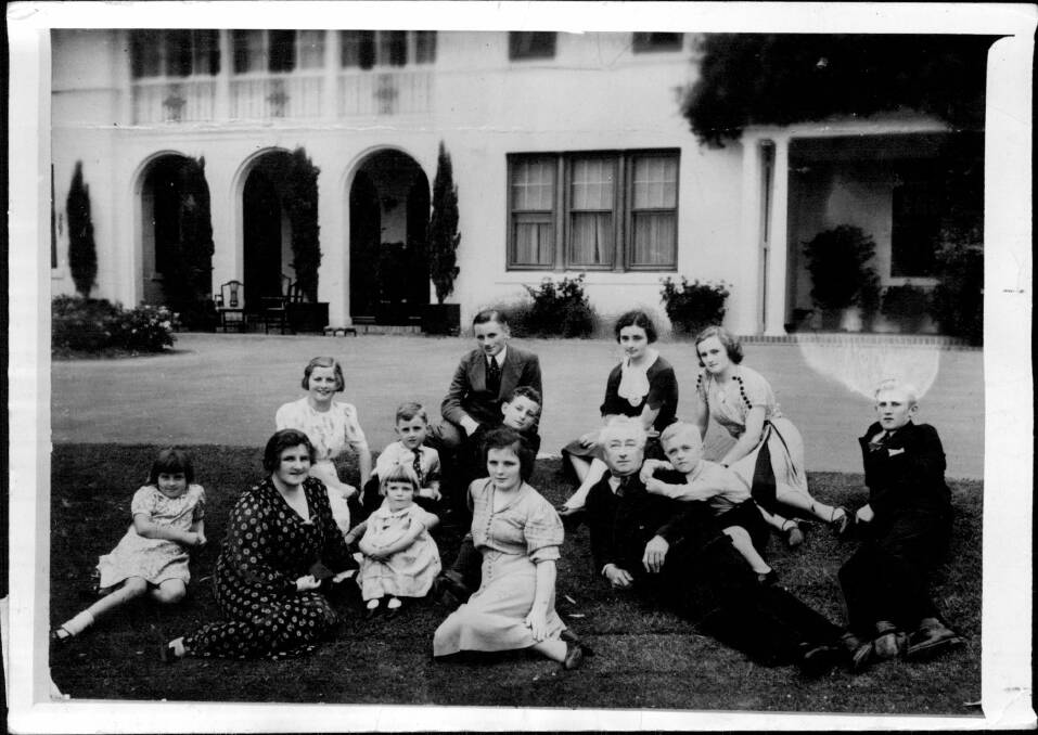 Joseph and Enid Lyons gathered on the lawn at The Lodge. The family maintained a home in Tasmania as well. Photo: National Library of Australia