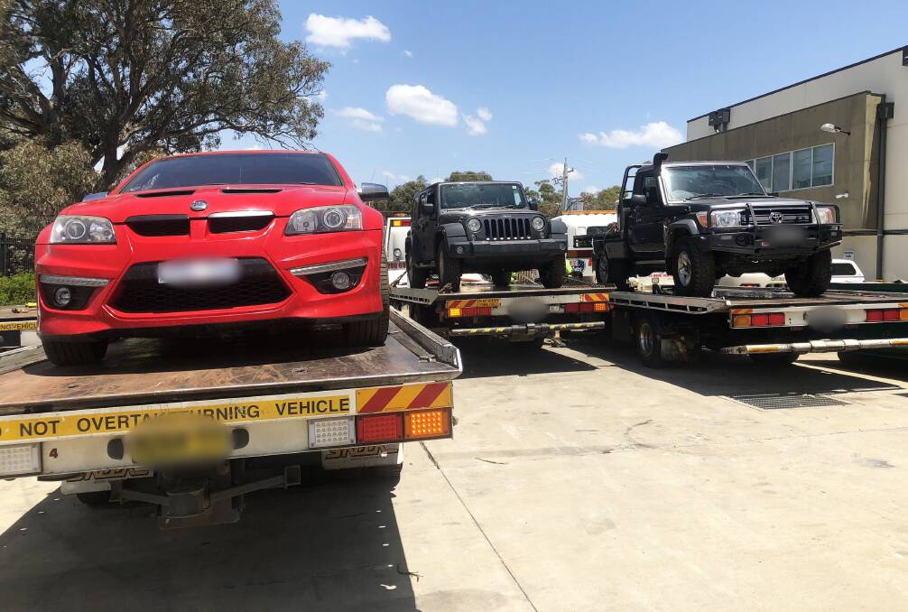 Stolen vehicles that were recovered by NSW and ACT Police in Queanbeyan on Thursday. Photo: ACT Policing
