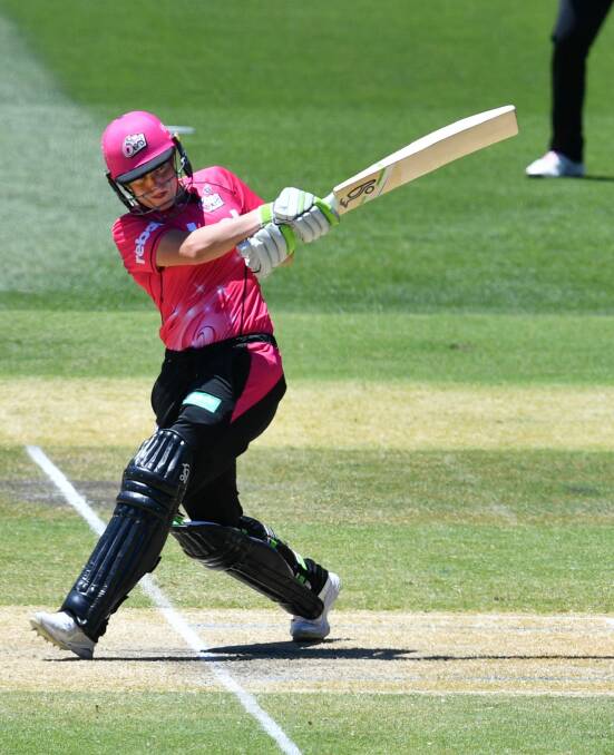 On front foot: Ellyse Perry takes toll of the Scorchers attack at Adelaide Oval. Photo: caption