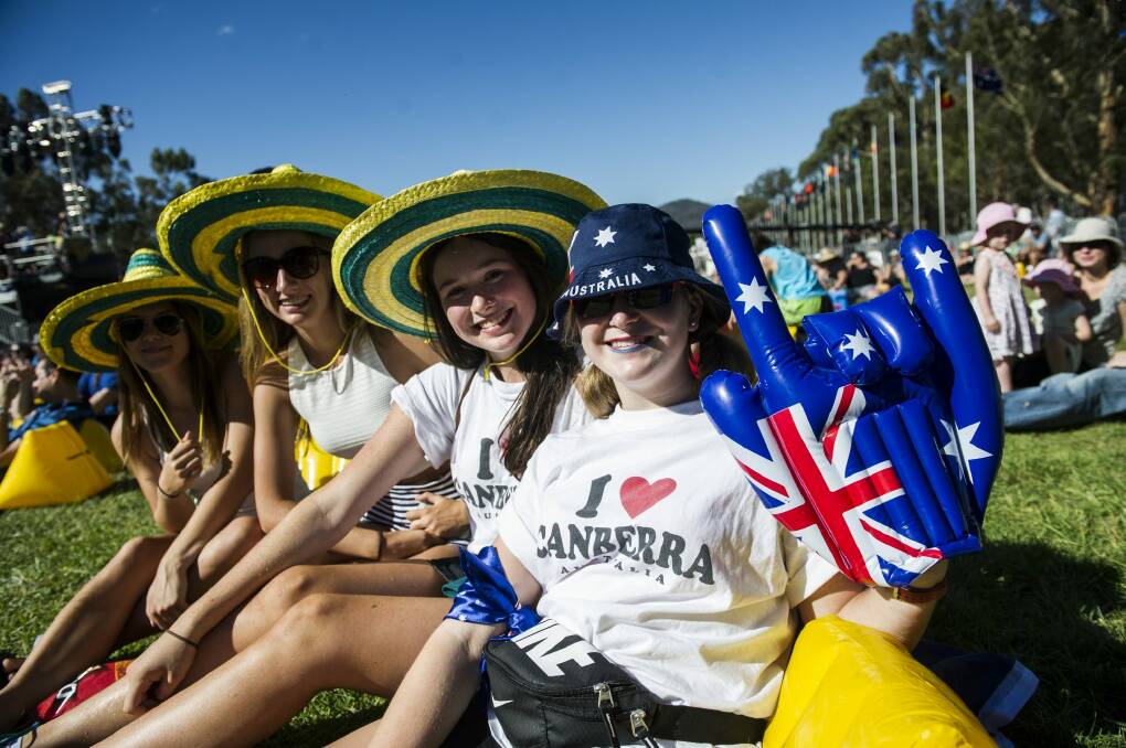 Sophie Rainbow, Vanessa Ryan, Rachel Toohey and Julia Cronan on the lawns of Parliament House for the Australia Day announcement and concert.
 Photo: Jay Cronan