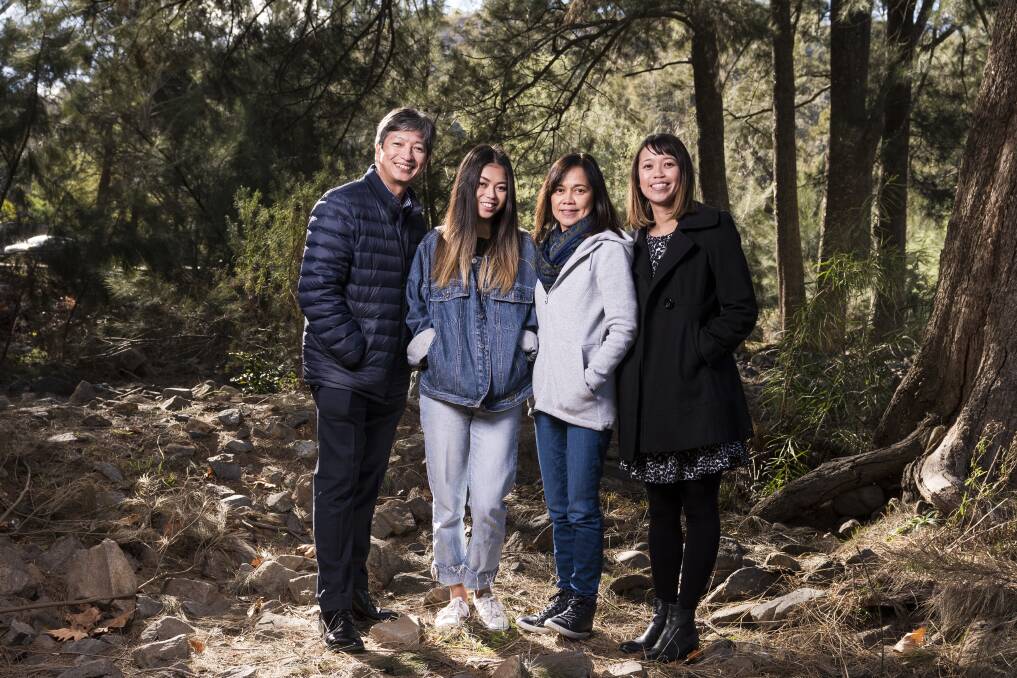 Kathleen Bautista (centre left) with her father Ronnie (left), mother Rowena (centre right), sister Megan (far right). Photo: Dion Georgopoulos