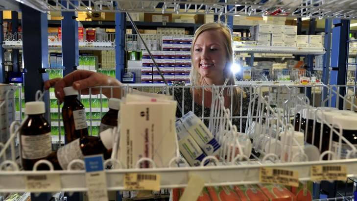 Canberra Uni has established an undergraduate pharmacy degree. Melissa Cowley,24 of Latham a former pharmacy assistant is now working as a pharmacy technician at Canberra Hospitalis one of the first people to enrol in the degree. Photo: Melissa Adams