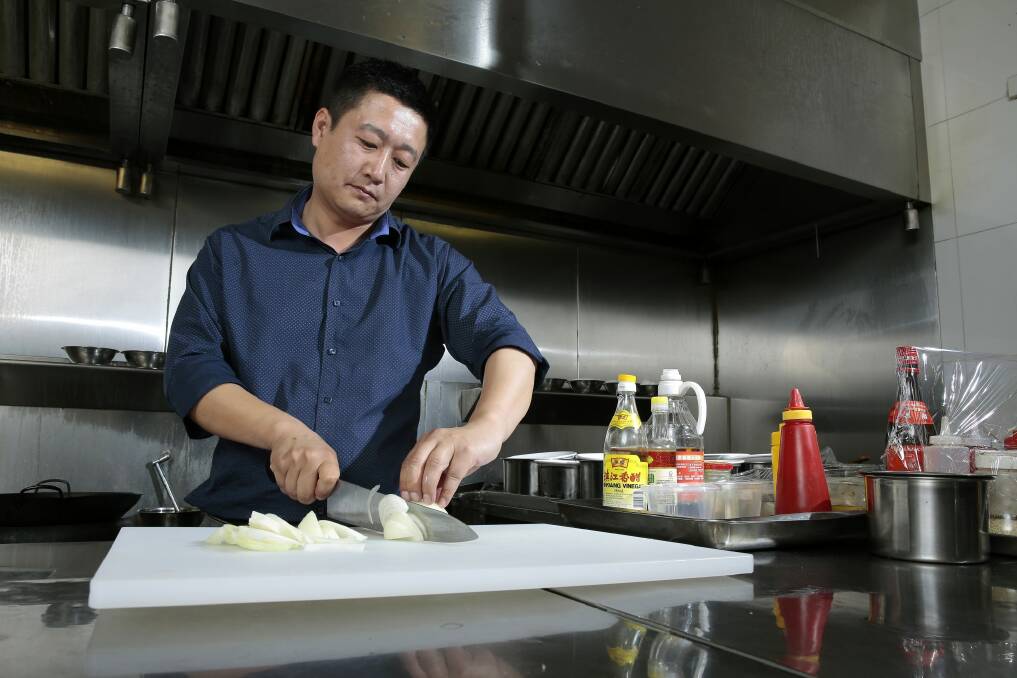New management: Spicy Ginger Cafe owner Richard Hou. Photo: Jeffrey Chan
