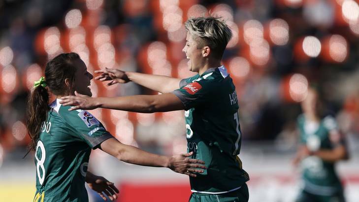 United's Michelle Heyman, right, celebrates with teammate Hayley Raso after scoring a goal against Japan's NTV Beleza. Photo: Reuters